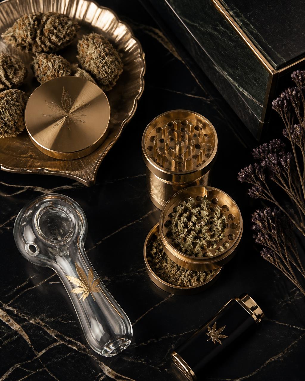 Luxury cannabis accessories laid out on black marble